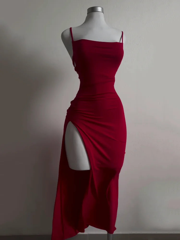 Vestido nuevo explosivo de verano 2024, vestido de alta sensibilidad con tirantes tipo halter y bolso Spice Girl a la cadera.