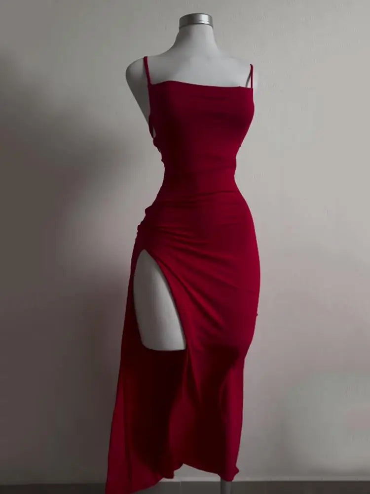 Vestido nuevo explosivo de verano 2024, vestido de alta sensibilidad con tirantes tipo halter y bolso Spice Girl a la cadera.